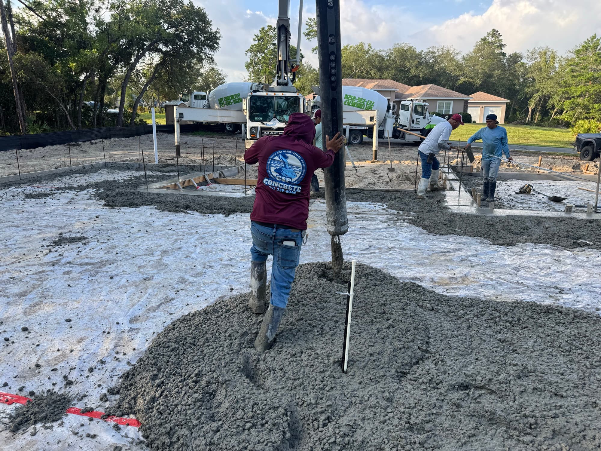 The CSP Concrete crew pumping and placing a concrete slab in Ocala, FL